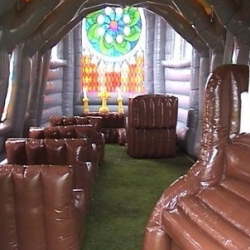 Bring new meaning to the term "shotgun wedding" and get married literally ANYWHERE. All you need is some witnesses, a church official and your very own $50,000 inflatable church.