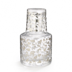 Ooooh animal covered carafe ~ Designed by Marco Susani and Elizabeth Vidal this charming water set features domestic farm and wild animals that have been screen printed onto the surface of the glass in pure silver.
