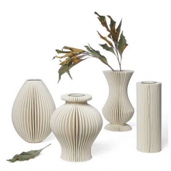 Designer Joshua Stone brings these hand made sculptural, contemporary vases consisting of industrial wool felt pieces, borosilicate beakers and reclaimed wood.