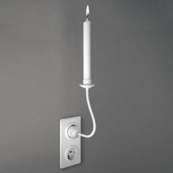 This "candle holder" plays with the idea of electricity versus natural light. It's not electric, it's simply a candleholder that is held up by a socket. Unfortunately, not available in the US.