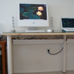 We've seen rain gutters mounted on the sides of buildings for planting... now as indoor desk mounted cable management!