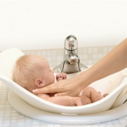 The Puj Tub fits in a standard sink, so you can stand comfortable while giving them a bath and is designed to fit around your baby just like you were holding them in your arms. The material is super soft, and flexible to wrap around your baby.
