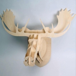 If you don't like putting real animals up on your wall, but still like the idea and the look of it, this moose bust made of beech wood might do the trick.