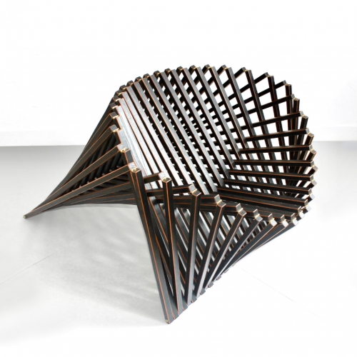 The Rising Chair transforms from a flat surface to a functional piece of art! Made by Robert van Embricqs