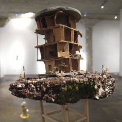 small scale sculptures of a scarred world by LA based sculptor, Jeremy Mora, at the Mark Wolfe Contemporary  Art Gallery in SF.