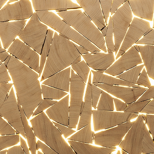Shattered Light is a compelling wallpaper by Rollout, based on the imagery of artist Brent Comber. The original design is part of a collection of LED embedded wood light fixtures, inspired by the instinctive process of finding order within imposed chaos.
