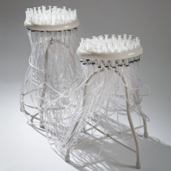 Featured at Milan Furniture Fair, Communicable Seats are constructed from disposable syringes, by Jamie Wolfond, RISD Furniture BFA '13.
