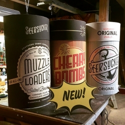 Seersucker Candy Co from Nashville's Olive & Sinclair. Seersuckers (soft sea salted dark choc ganache), Muzzle Loaders (salted bourbon caramel filled choc spheres) + Cherry Bombs (pickled cherry cordials) in old phonograph cylinder style packaging.