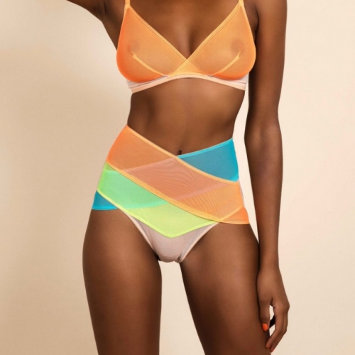 Isosceles is a unique, independent lingerie label making waves out of London with their debut collection. Deriving their name from geometry, their designs swathe the female body in an architectural rainbow of graphic and figure-flattering neon shapes.