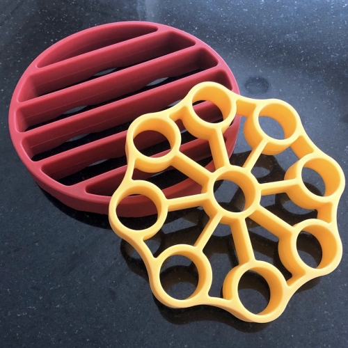 [Found in the NOTCOT kitchen!] The OXO Pressure Cooker Egg Rack and general Rack that also works well in the oven or as a nice thick silicone trivet! You can even stack two egg racks that each hold 9 eggs. 