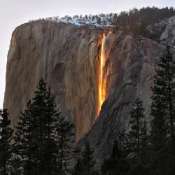 Apparently Horsetail Falls in Yosemite turns golden around sunset ~ stunning photo by Rob Kroenert