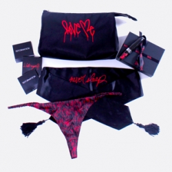 Love Me for Reformation ~ a valentine's day sex kit of sorts... a limited edition silk “Love Me” thong, “Never Sleep” silk blindfold, “Fuck Me”, “Hurt Me” and “Love Me” temporary tattoos, “I Hate Myself” matchbook Trojans and a “Love Me” branded Lelo MIA.