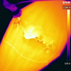 A dance with hot glass, seen through a thermal camera. Shot as a means of testing theories of hot glass working temperatures and presented as an artistic expression.