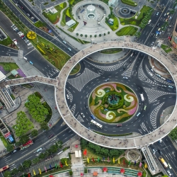 The new Lujiazui circular pedestrian bridge in Shanghai is a 5.5-meter-high walkway and can fit 15 people walking side by side.