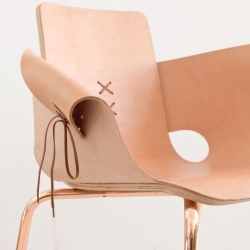 Martín Azúa, Spanish designer presents Shoemaker flesh, made of wood, leather and lace, this chair takes some codes of the shoe to draw the line.