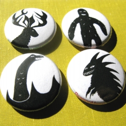 One of each of our favorite cryptids in silhouette: Bigfoot, Loch Ness Monster, Chupacabra, and a Jackalope