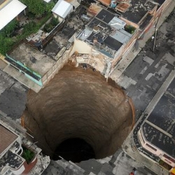 This sinkhole posted to the Guatemalan Government’s Flickr appeared last Sunday in a street intersection in Zone 2 of Guatemala City. 
