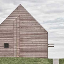 Project Summer House in Southern Burgenland (Austria) by Judith Benzer Architektur describes a simple sharp-edged cubature, fitting into its surroundings.