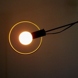 The simple elegance of Art Donovan's Sun+Moon Lamp.  Minimalism with a nod the antique sciences.