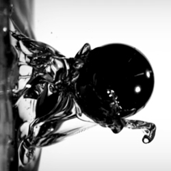 Romain Glé for the Team Ghost's High Hopes is simply beautiful. The water droplets seem to be clashing with the black ball in an epic battle. Unlike any other high speed video of water droplets we've seen.