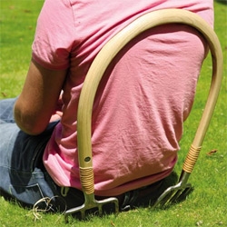 English designer, Langton Stead, designed this clever bent wood s(tool)seat back with two garden forks attached to the bottom, when inserted into your lawn you can sit back and relax.
