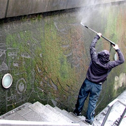 Strook (Stefan De Croock)'s reverse graffiti installation for De Invasie & Stuk.