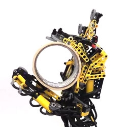 Watch Max Shepherd's prosthetic robotic arm made from LEGO in action.