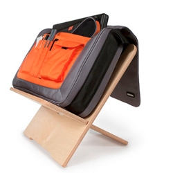 Workiture makes furniture for your bag, keeping it off the floor without costing you valuable desk space.