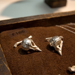 The Weird and Wonderful jewelry of Kate Gilliland, who turns nature's tragedies into beautiful works of wearable natural history in a stunning range from tiny bird skull cufflinks to toadlet rings.