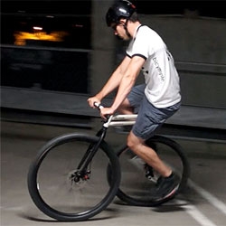 The Bicymple, a simple unicycle meets bicycle in which a direct-drive, freewheeling hub joins the crank arm axis with the rear-wheel axis, shortening the wheelbase.