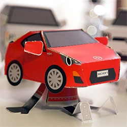 Shin Tanaka for Scion! Paper Shapers in the shapes of the Scion FR-S, iQ, xB, xC, and xD complete with little speaker sneakers, arms, and more.