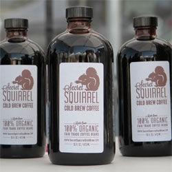 Secret Squirrel Cold Brew Coffee, a coffee concentrate cold brewed for 18-24 hours using filtered water and ground beans, it can be mixed with water or milk.