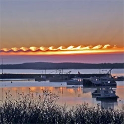 Beautiful wave-like Kelvin-Helmholtz clouds captured on Jonesport, Maine.