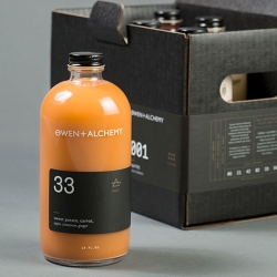 Minimal juice packaging for Owen + Alchemy in Chicago by Jack Muldowney & Potluck Creative.