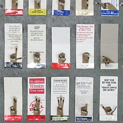 JK Keller made a series of American Sign Language hands out of match books.