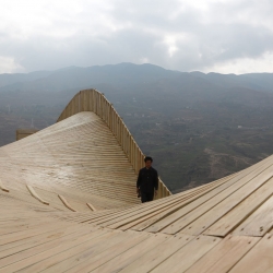 The Warp in  Ludian town, Yunnan, China is an undulating viewing platform by architects John Lin and Olivier Ottervaere.
