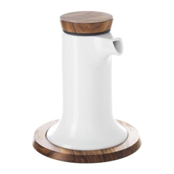 Ikea jumps on the porcelain and wood trend with a new line of kitchen accessories ~ this one is the Celeber by Anna Lerinder ~ a soy sauce pourer with lid and base