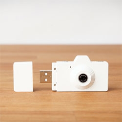 The tiny Superheadz Clap Camera is a 2 megapixel camera and memory card reader.