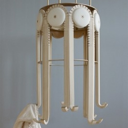 Respond, a mechanical coat rack from Nicole Schindelholz. The interactive coat rack moves when a coat is hung.