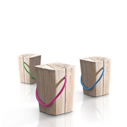 Hug stool by Emo Design made from irregular and worn pieces of wood.