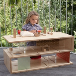 Qubis haus, part coffee table, part doll house.