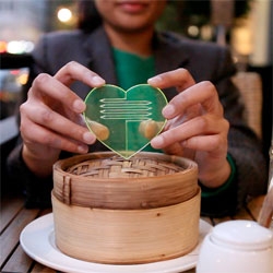 Heart Part, a clever biodegradable utensil that splits to form two utensils, fork and knife, in addition to a scoop.