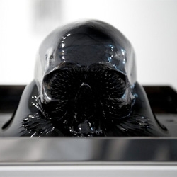Alessandro Brighetti's stunning Schizophrenia, a moving piece that makes fantastic use of ferrofluid. (But sadly the skull/brain are just objects in the liquid)