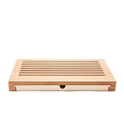 Alessi's Sbriciola Bread Cutting Board catches all those bread crumbs as you slice.