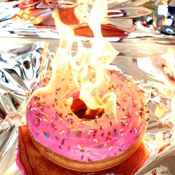Henry Hargreaves's photo essay "Burning Calories" literally sets caloric foods alight.