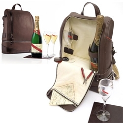 When is a bag more than just a gorgeous leather expedition pack? When it's filed with chilled champagne, indestructible glasses, a compass, and a silk map... Mumm Expedition Kit