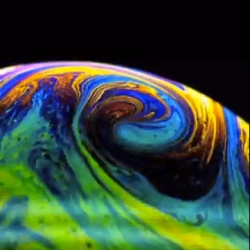 Cyclone style vortices created by heating soap bubbles from beneath.