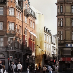 French architect Manuelle Gautrand has designed a facade of folded glass to link the old & new Copenhagen city.