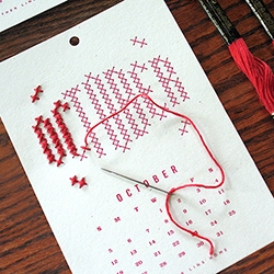 Stitch a pretty typography-based design each month of 2014 with this Year in Stitches Calendar Kit. No cross stitch skills necessary. By Heather Lins Home
