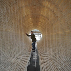 Zhu Jinshi's 12-meter long installation 'Boat' made up of 8,000 sheets of rice paper and 800 bamboo shafts.